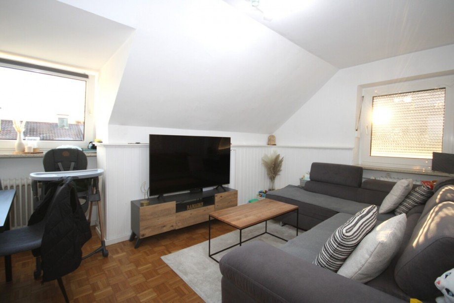 Wohnzimmer DG Mehrfamilienhaus Planegg