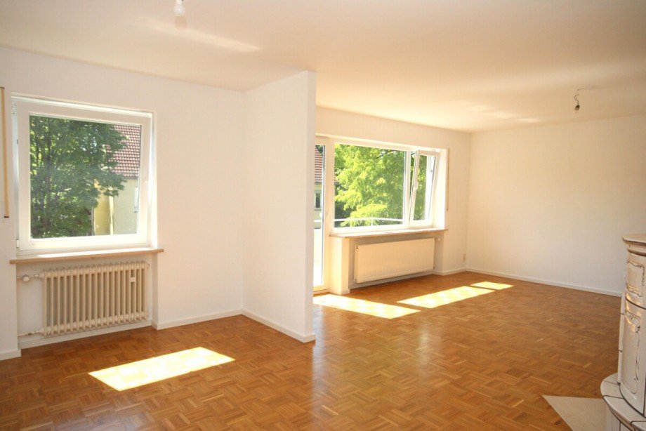 Wohnzimmer OG Mehrfamilienhaus Planegg