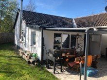 Terrasse Einfamilienhaus auf einem 772 m� Grundst�ck mit Doppelgarage, 4 Carports und Werkstatt.